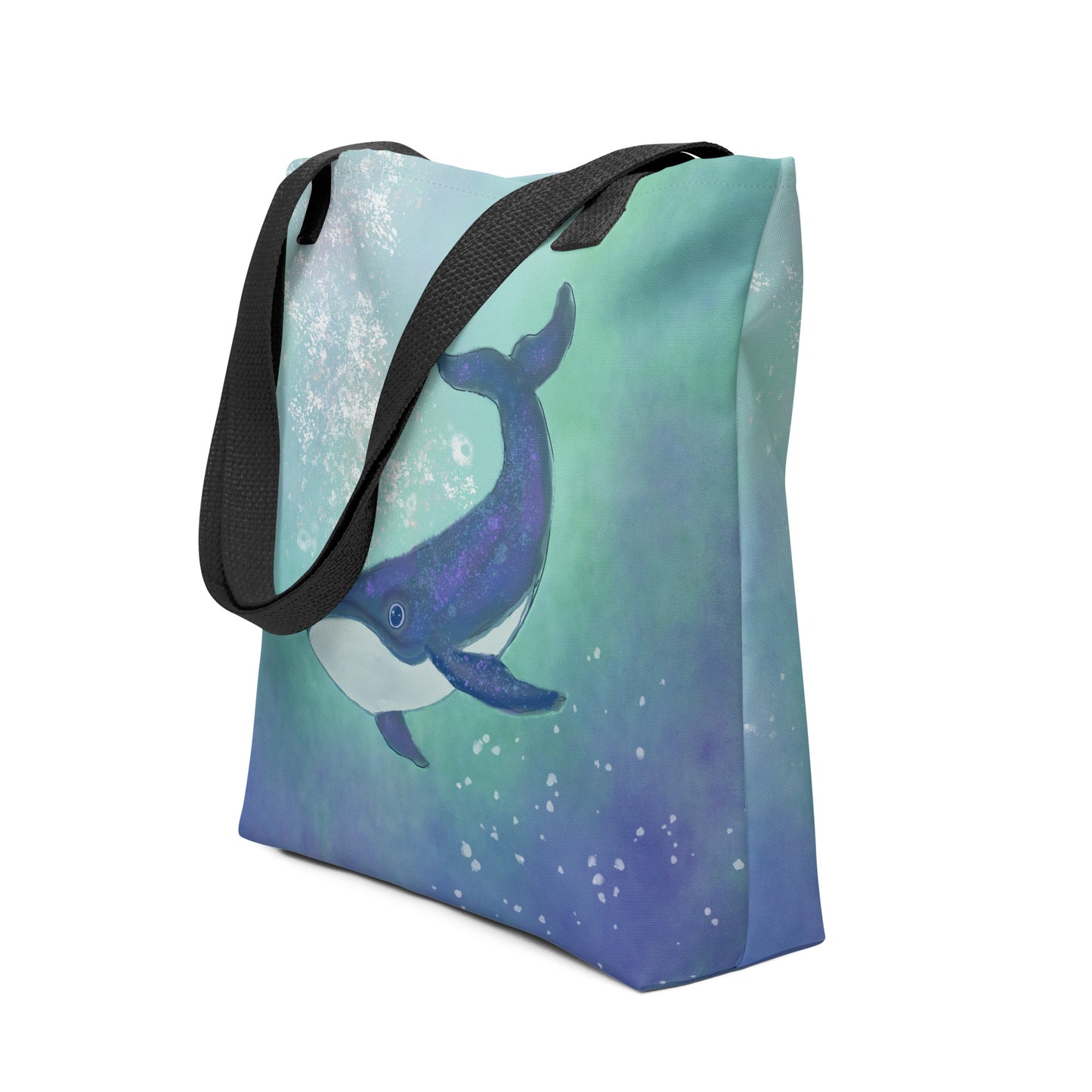 Side view of tote bag with a whale design on a white background