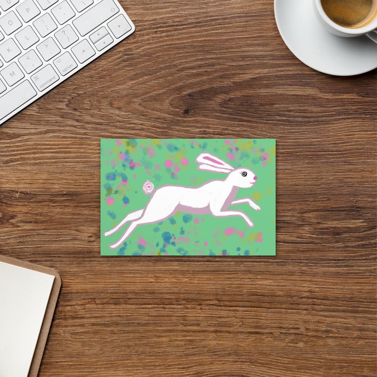 Hare and rabbit are symbols of the trickster--who inspires the artist, musician, comedian, writter. Seen on this postcard running through a field of spring flowers.