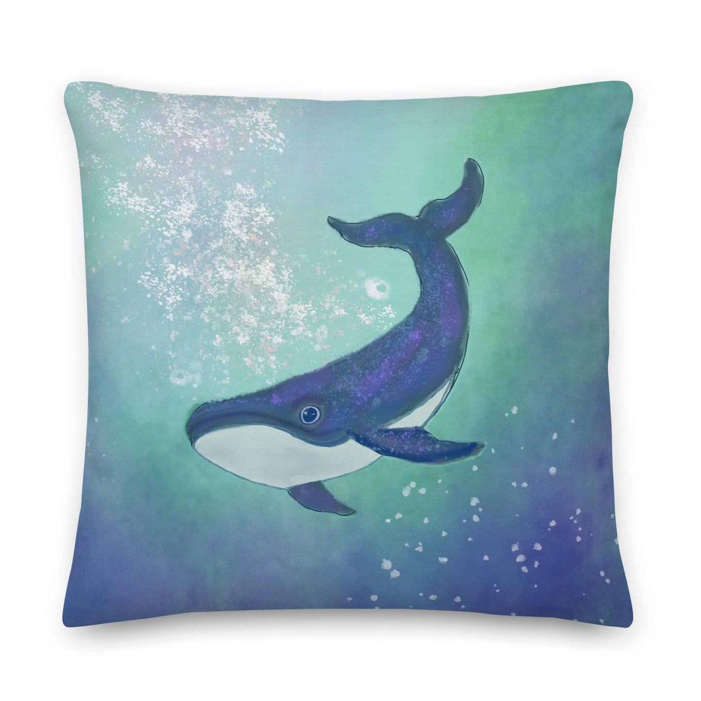 Whale design is shown on both sides of a decorative pillow,