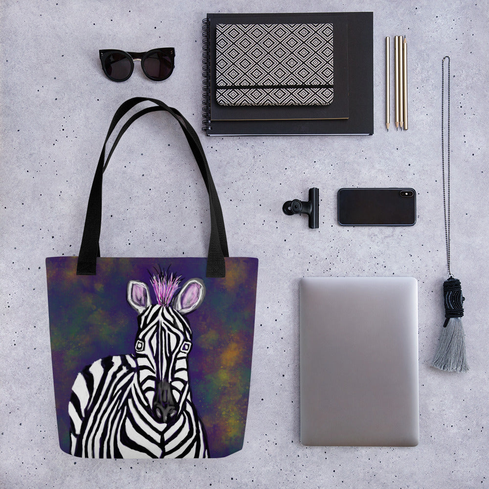 Stand out with this stylish and bold tote back with an image of a zebra. Large enough to hold laptops and notebooks and all the necessities for a trip to the office or the coffee shop.