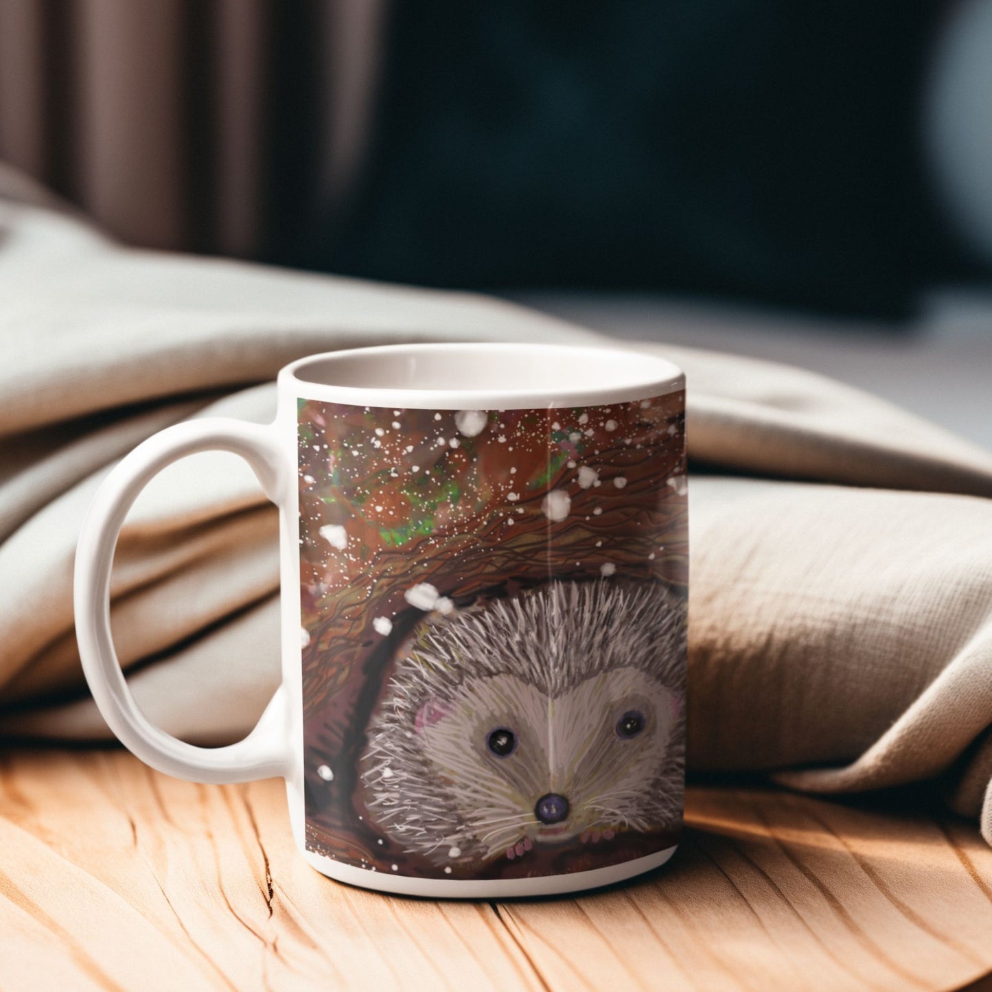 Mug with a hedgehog design on a wooden surface