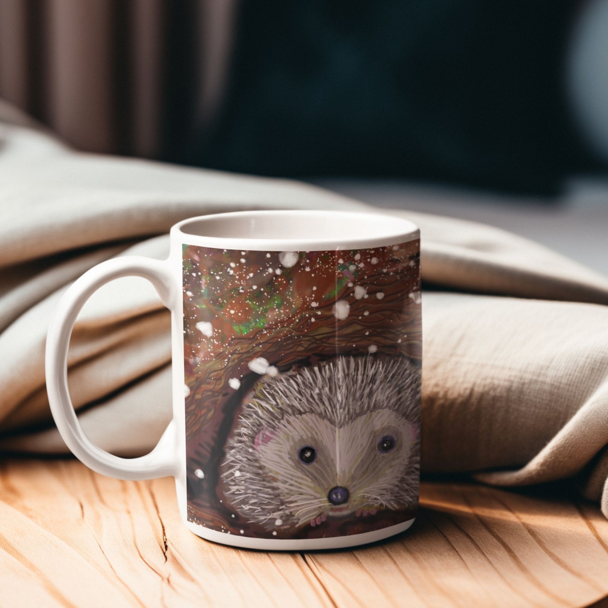 Mug with a hedgehog design on a wooden surface