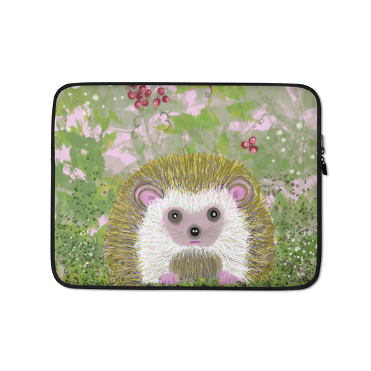 Cute little hedgehog graces the laptop sleeve. Hedgehog is shown in a field of green and pink with berries and white butterflies. Hedgehog is a spirit animal and guide to a kind and patient connection to Mother Earth.