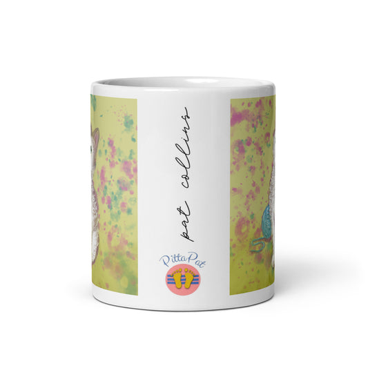 PittaPat logo with artist's signature on a Kitten Mug.