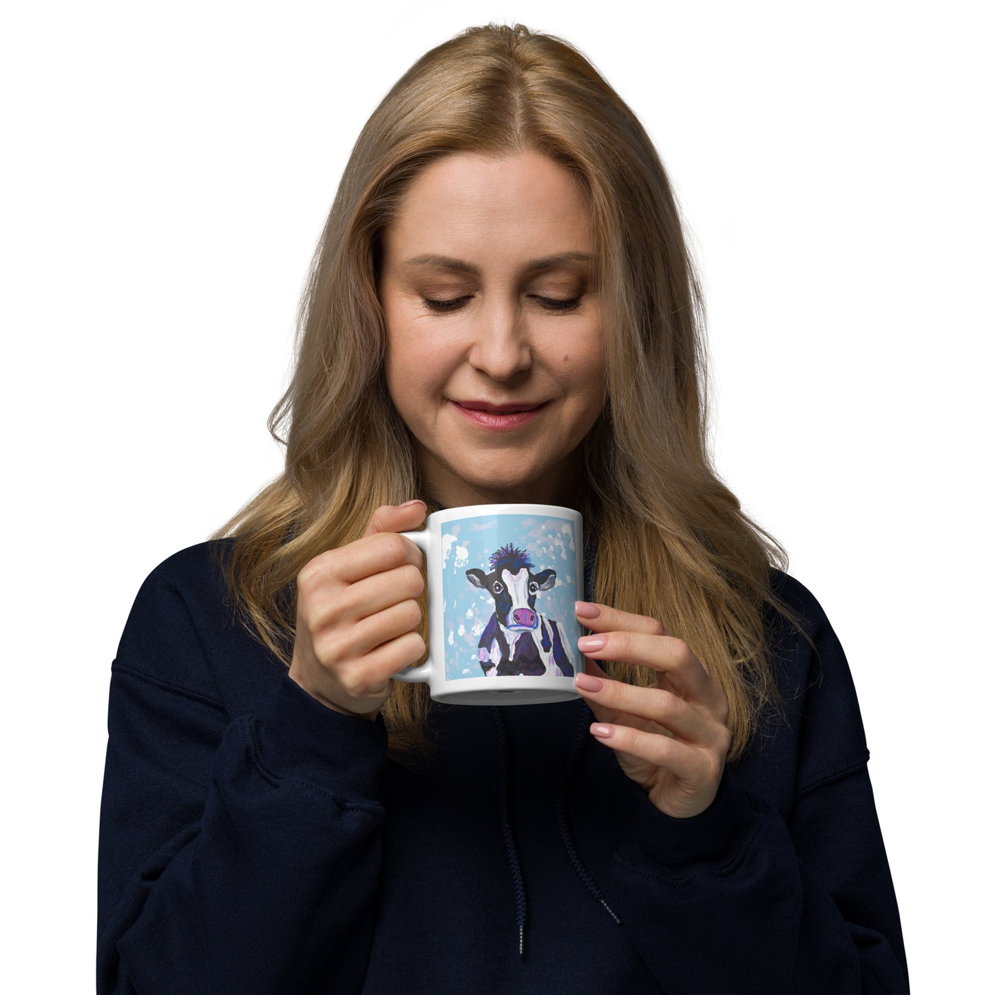 Woman holding a mug with a cow design on a white background. Cow symbolizes nurturing, abundance, and the gentle strength of Earth.