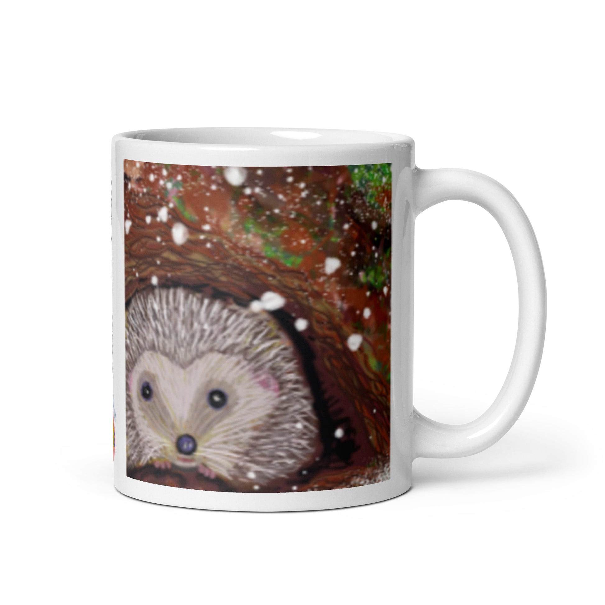 Ceramic mug with hedgehog nestled at the base of a tree in winter, snow falling gently, symbol of rest, protection, and good boundaries. 11 oz