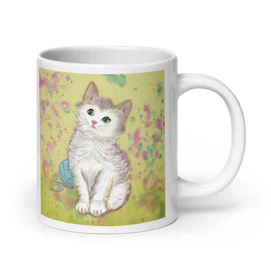 Ceramic mug with kitten spirit artwork, symbol of curiosity, playfulness, and gentle comfort.