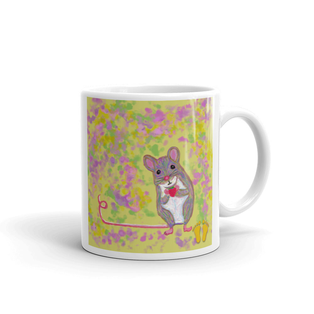 Cute mouse holding strawberry coffee mug for animal lovers. Unique  design has a  sweet expression. Mouse on field of yellow., pink and green. Stamped with artist's golden toes mark. 11 oz mug