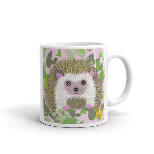 Coffee mug for hedgehog  lovers. Unique  design has a  sweet expression. Hedgehog on field of green and pink. Stamped with artist's golden toes mark. 11 oz mug