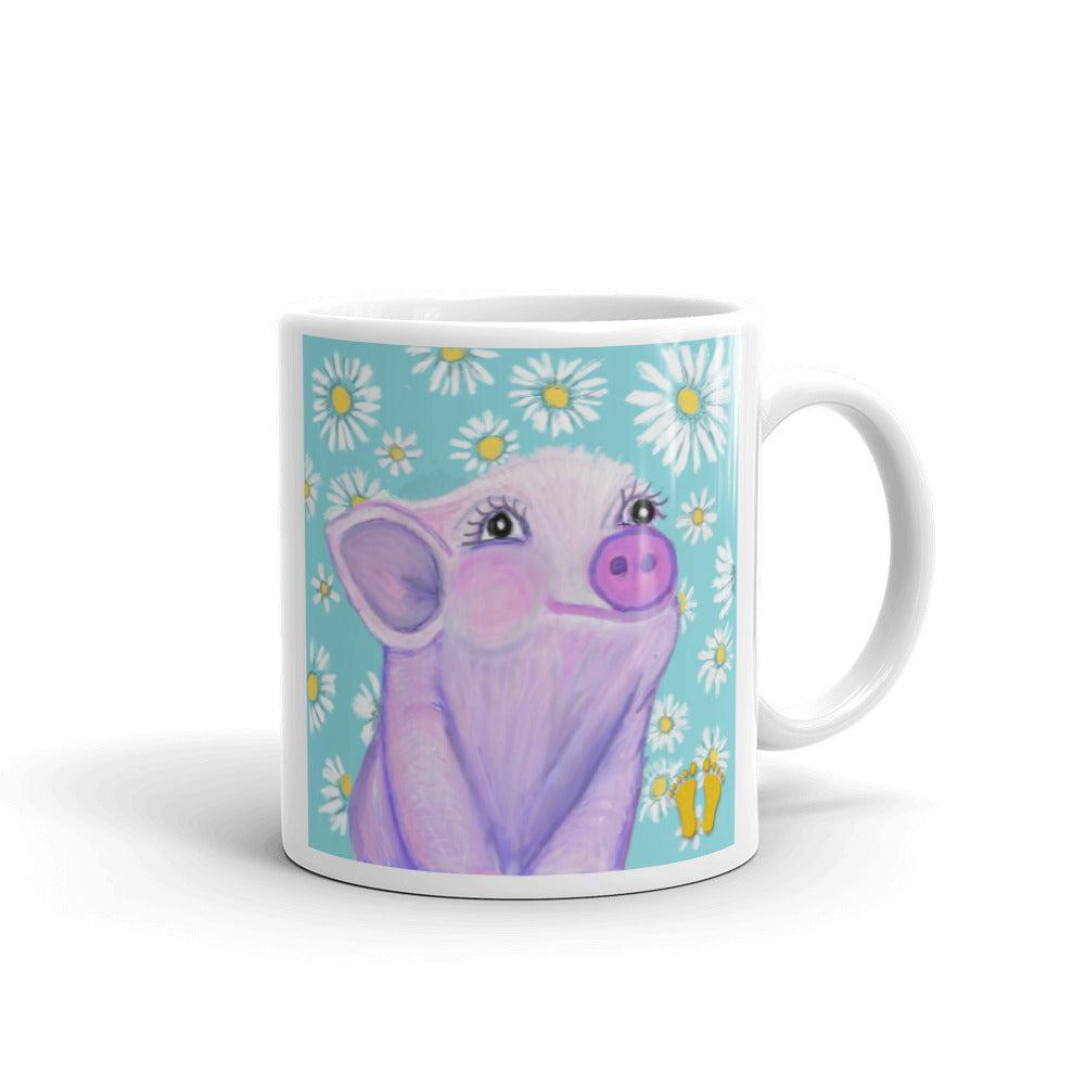 Coffee mug for piglet lovers. Unique piglet design has sweet expression. Piglet on field of blue with white and yellow daisies. Stamped with PittaPat’s golden toes mark. 11 oz mug